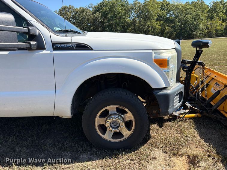 image for item DT3042 2015 Ford F250 Super Duty Ext. Cab dump flatbed pickup truck