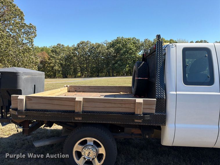 image for item DT3042 2015 Ford F250 Super Duty Ext. Cab dump flatbed pickup truck