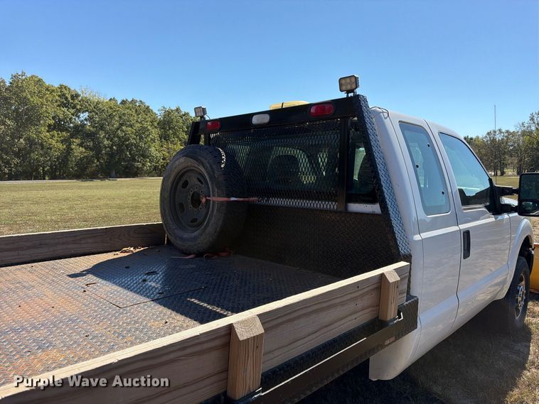 image for item DT3042 2015 Ford F250 Super Duty Ext. Cab dump flatbed pickup truck