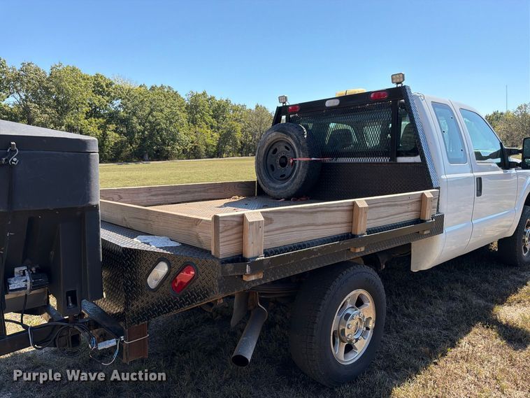 image for item DT3042 2015 Ford F250 Super Duty Ext. Cab dump flatbed pickup truck