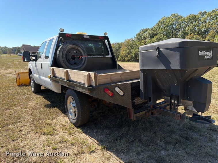 image for item DT3042 2015 Ford F250 Super Duty Ext. Cab dump flatbed pickup truck