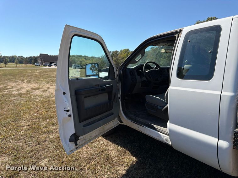 image for item DT3042 2015 Ford F250 Super Duty Ext. Cab dump flatbed pickup truck