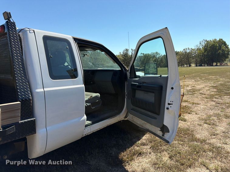 image for item DT3042 2015 Ford F250 Super Duty Ext. Cab dump flatbed pickup truck