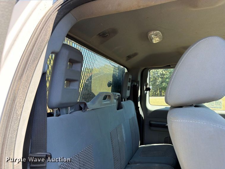 image for item DT3042 2015 Ford F250 Super Duty Ext. Cab dump flatbed pickup truck