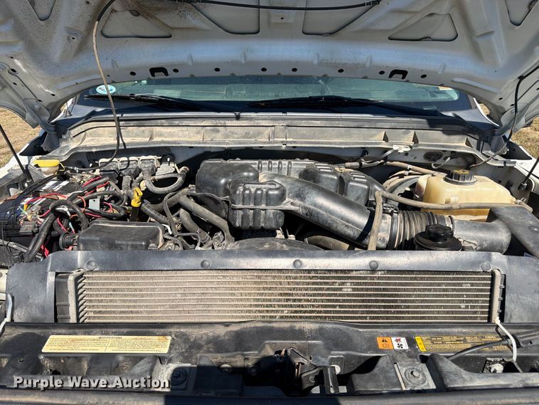 image for item DT3042 2015 Ford F250 Super Duty Ext. Cab dump flatbed pickup truck