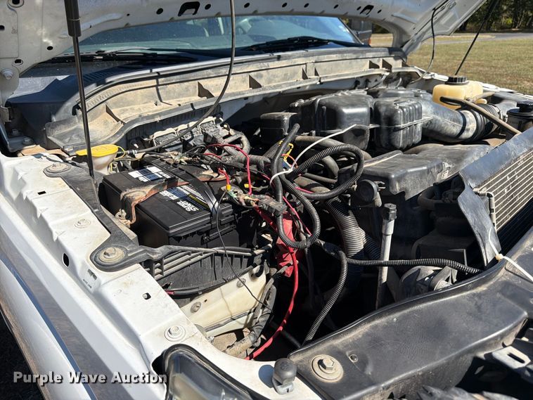 image for item DT3042 2015 Ford F250 Super Duty Ext. Cab dump flatbed pickup truck