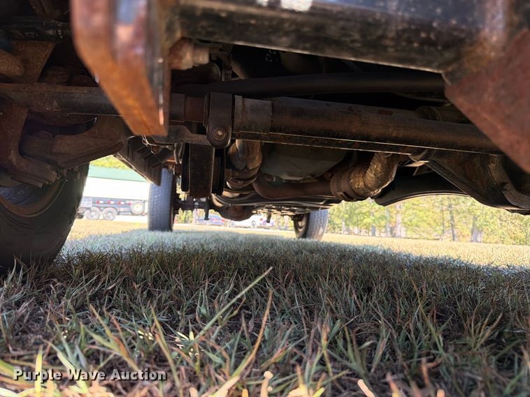 image for item DT3042 2015 Ford F250 Super Duty Ext. Cab dump flatbed pickup truck