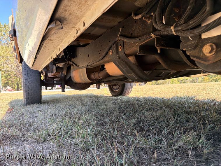 image for item DT3042 2015 Ford F250 Super Duty Ext. Cab dump flatbed pickup truck