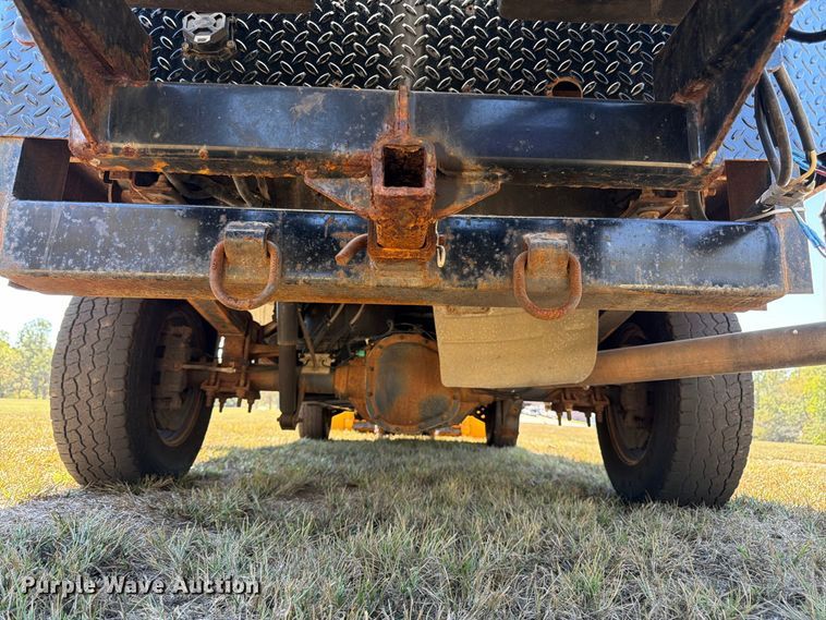 image for item DT3042 2015 Ford F250 Super Duty Ext. Cab dump flatbed pickup truck