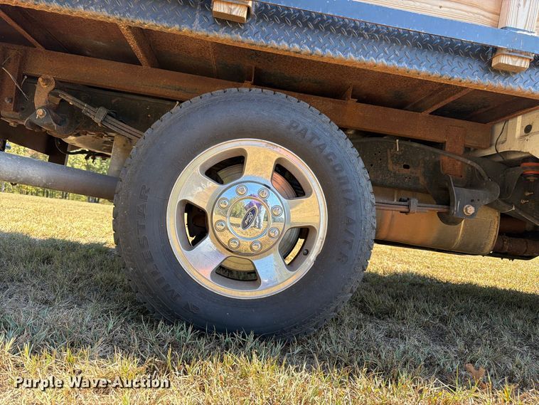 image for item DT3042 2015 Ford F250 Super Duty Ext. Cab dump flatbed pickup truck