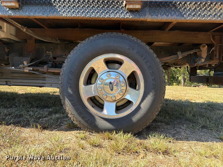 image for item DT3042 2015 Ford F250 Super Duty Ext. Cab dump flatbed pickup truck