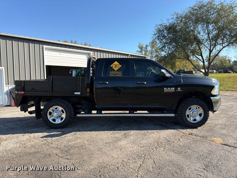 image for item DT3049 2018 RAM 2500 Crew Cab flatbed pickup truck