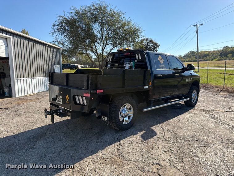 image for item DT3049 2018 RAM 2500 Crew Cab flatbed pickup truck