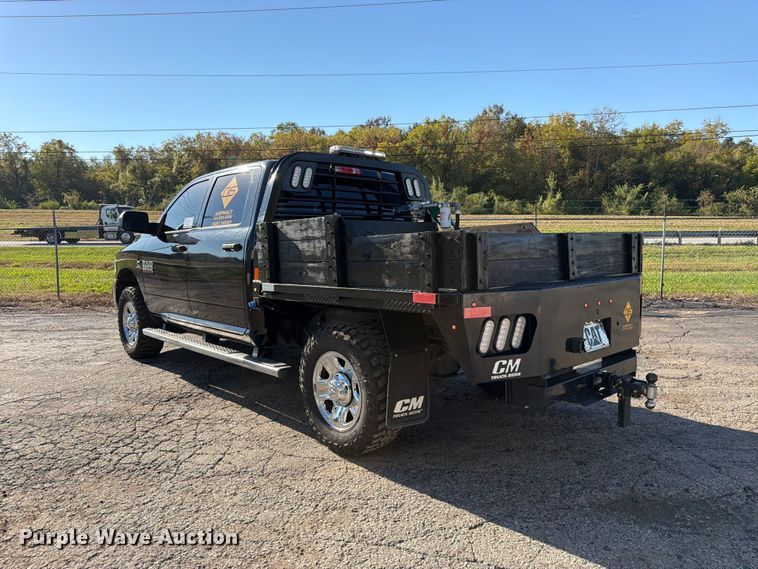 image for item DT3049 2018 RAM 2500 Crew Cab flatbed pickup truck