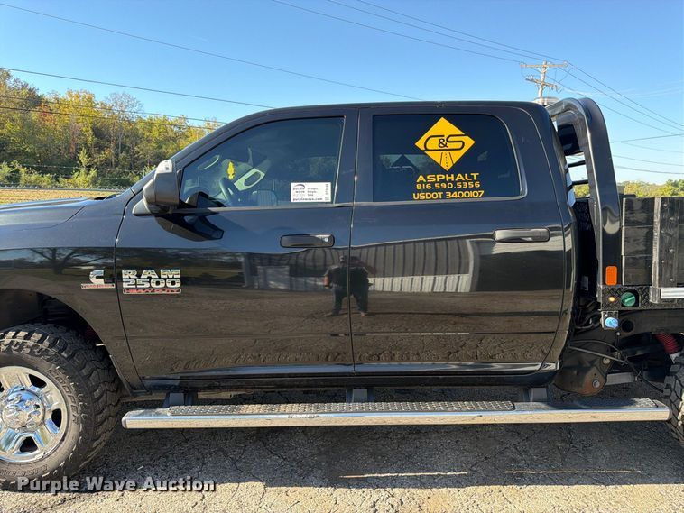 image for item DT3049 2018 RAM 2500 Crew Cab flatbed pickup truck