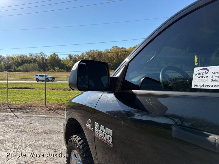 image for item DT3049 2018 RAM 2500 Crew Cab flatbed pickup truck