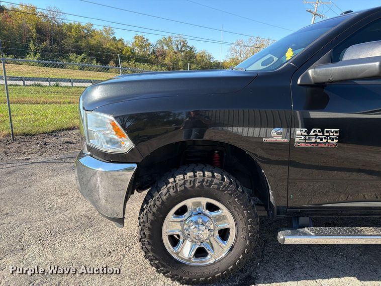 image for item DT3049 2018 RAM 2500 Crew Cab flatbed pickup truck