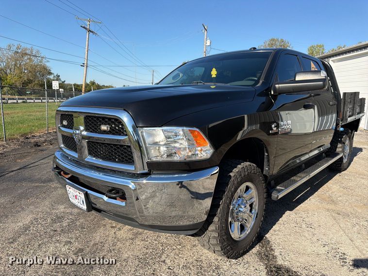 image for item DT3049 2018 RAM 2500 Crew Cab flatbed pickup truck