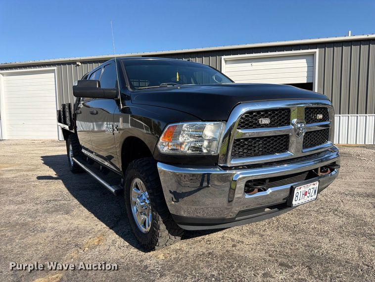 image for item DT3049 2018 RAM 2500 Crew Cab flatbed pickup truck