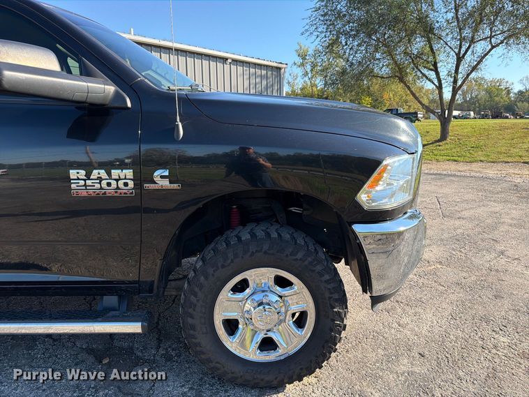 image for item DT3049 2018 RAM 2500 Crew Cab flatbed pickup truck