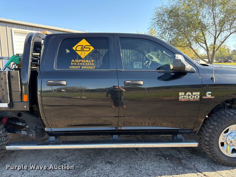 image for item DT3049 2018 RAM 2500 Crew Cab flatbed pickup truck