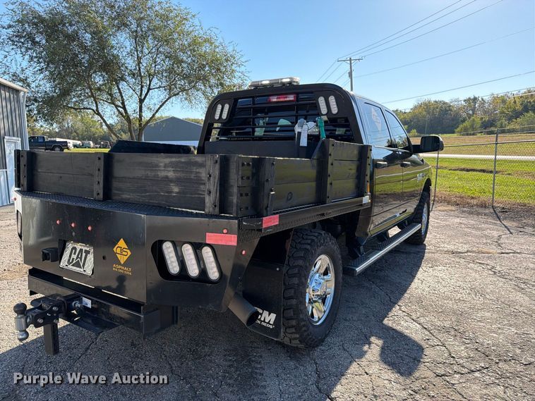 image for item DT3049 2018 RAM 2500 Crew Cab flatbed pickup truck