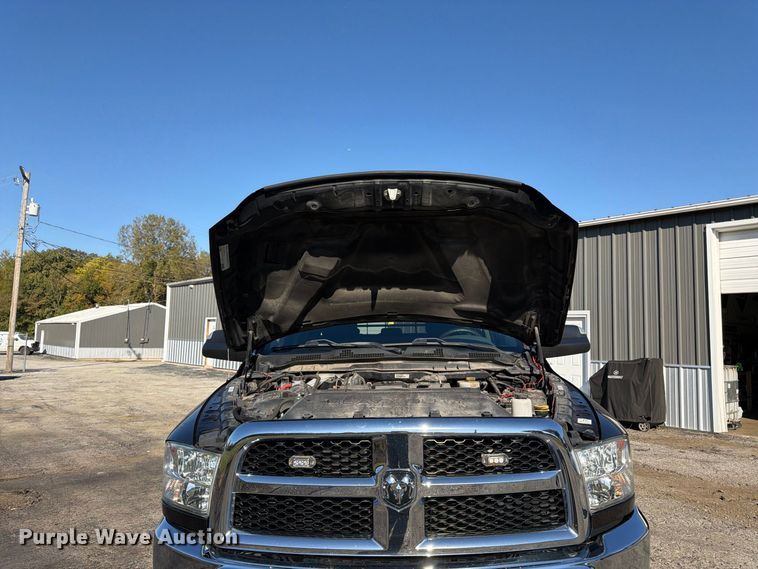 image for item DT3049 2018 RAM 2500 Crew Cab flatbed pickup truck