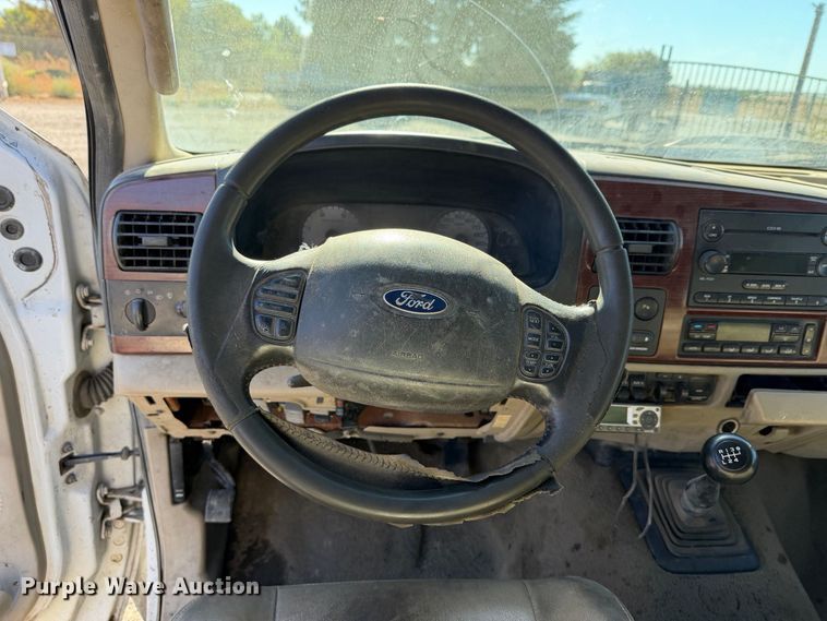 image for item EA0042 2005 Ford F350 Super Duty Crew Cab utility bed pickup truck