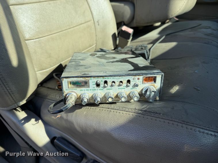image for item EA0042 2005 Ford F350 Super Duty Crew Cab utility bed pickup truck