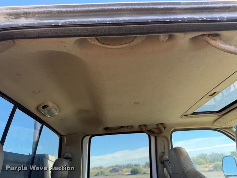 image for item EA0042 2005 Ford F350 Super Duty Crew Cab utility bed pickup truck