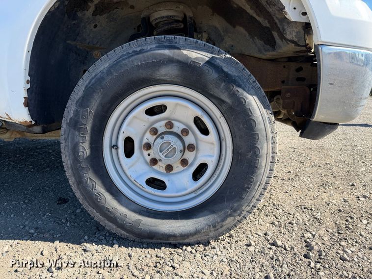 image for item EA0042 2005 Ford F350 Super Duty Crew Cab utility bed pickup truck