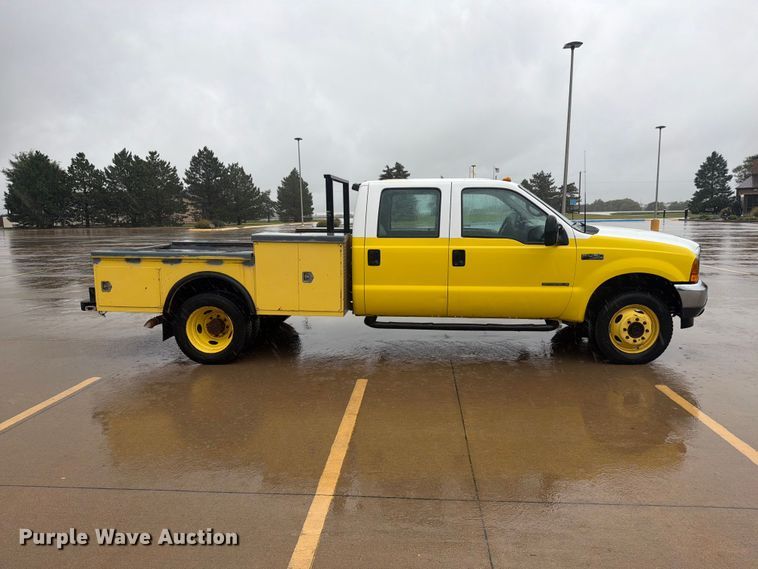 image for item EI7759 1999 Ford F450 Crew Cab flatbed truck