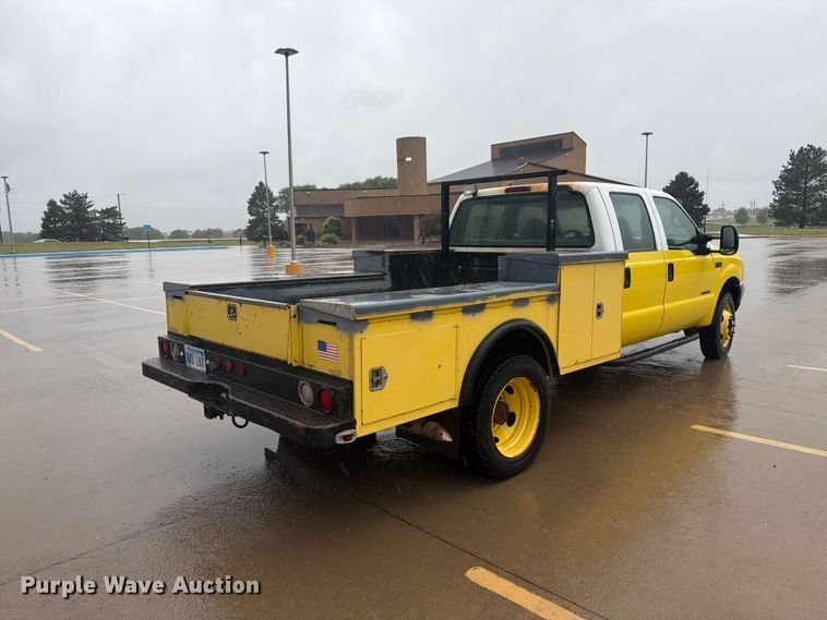 image for item EI7759 1999 Ford F450 Crew Cab flatbed truck