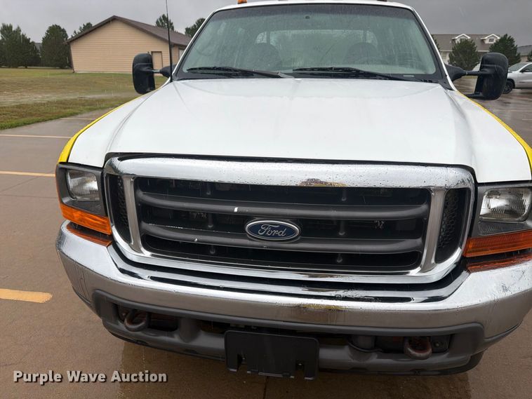 image for item EI7759 1999 Ford F450 Crew Cab flatbed truck