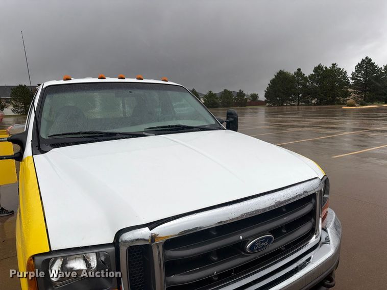 image for item EI7759 1999 Ford F450 Crew Cab flatbed truck