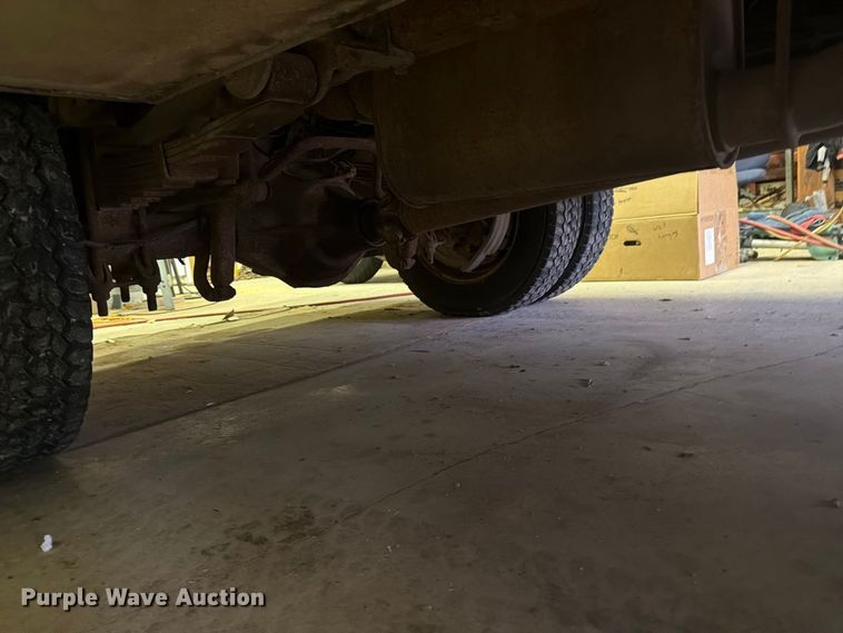 image for item EI7759 1999 Ford F450 Crew Cab flatbed truck