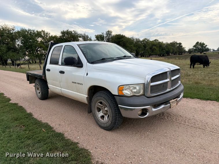 image for item EP7847 2003 Dodge Ram 1500 Crew Cab flatbed pickup truck