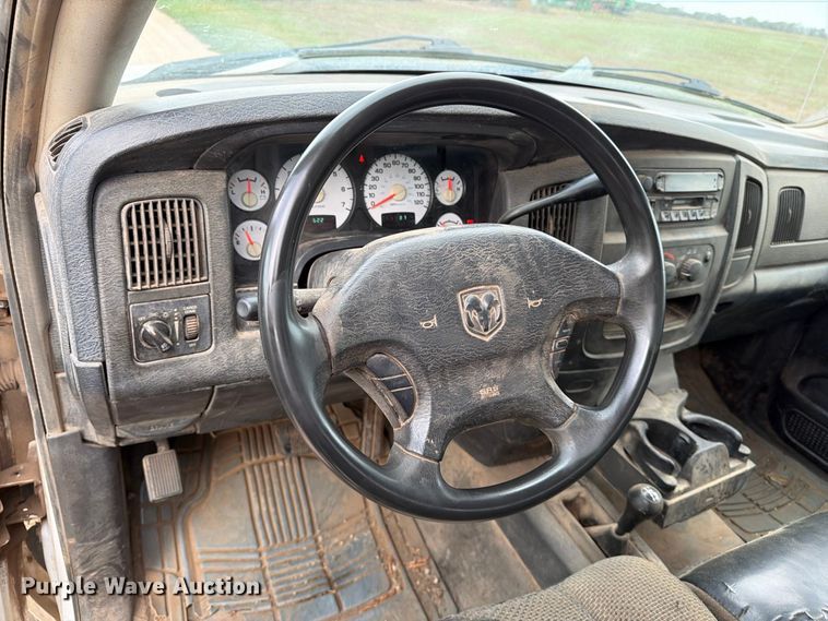 image for item EP7847 2003 Dodge Ram 1500 Crew Cab flatbed pickup truck