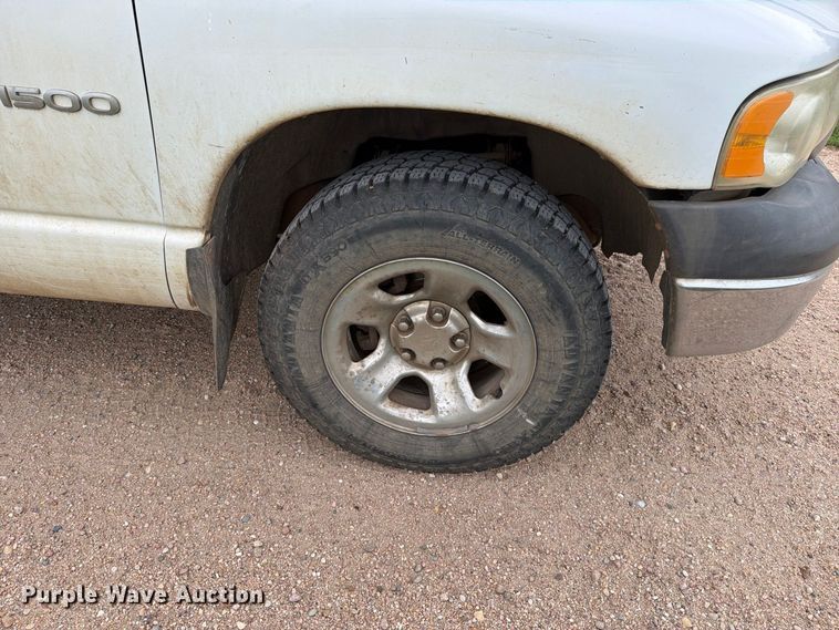 image for item EP7847 2003 Dodge Ram 1500 Crew Cab flatbed pickup truck