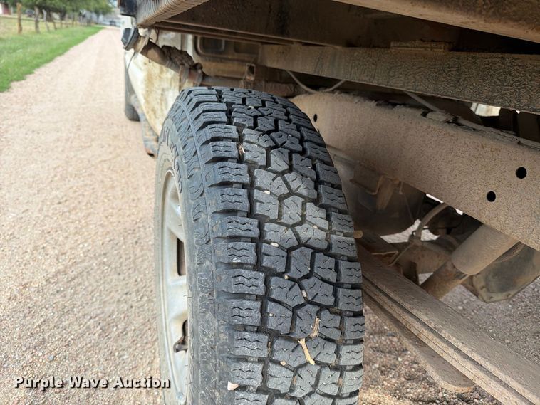 image for item EP7847 2003 Dodge Ram 1500 Crew Cab flatbed pickup truck