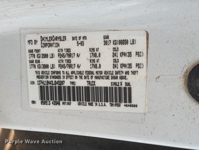 image for item EP7847 2003 Dodge Ram 1500 Crew Cab flatbed pickup truck