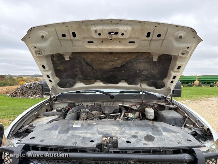 image for item EX1047 2008 Chevrolet Silverado 2500HD Ext. Cab dump flatbed pickup truck