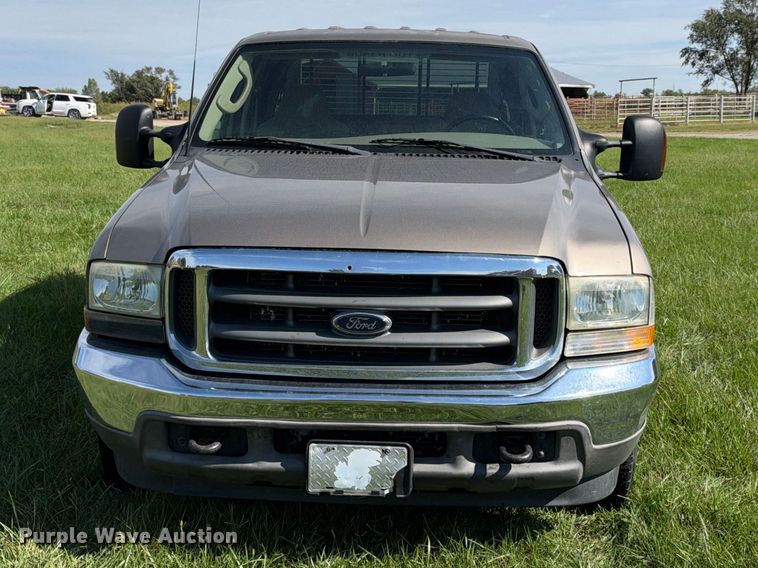 image for item EX2277 2003 Ford F250 Super Duty XLT Crew Cab flatbed pickup truck