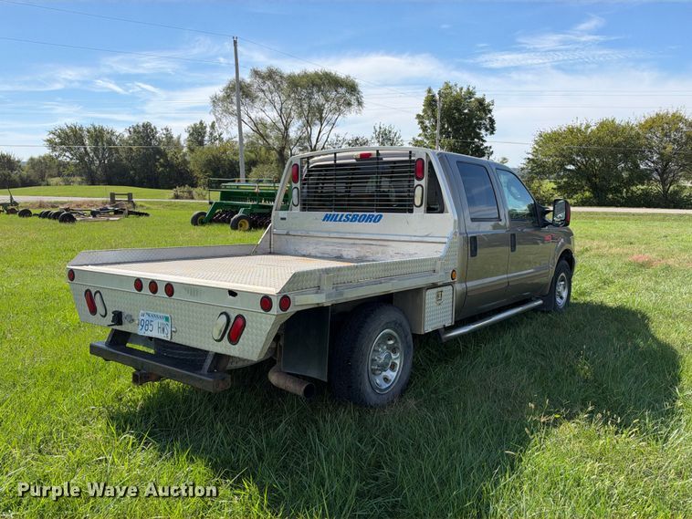 image for item EX2277 2003 Ford F250 Super Duty XLT Crew Cab flatbed pickup truck