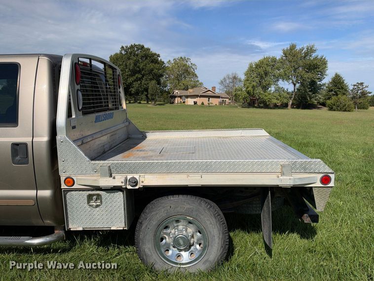 image for item EX2277 2003 Ford F250 Super Duty XLT Crew Cab flatbed pickup truck