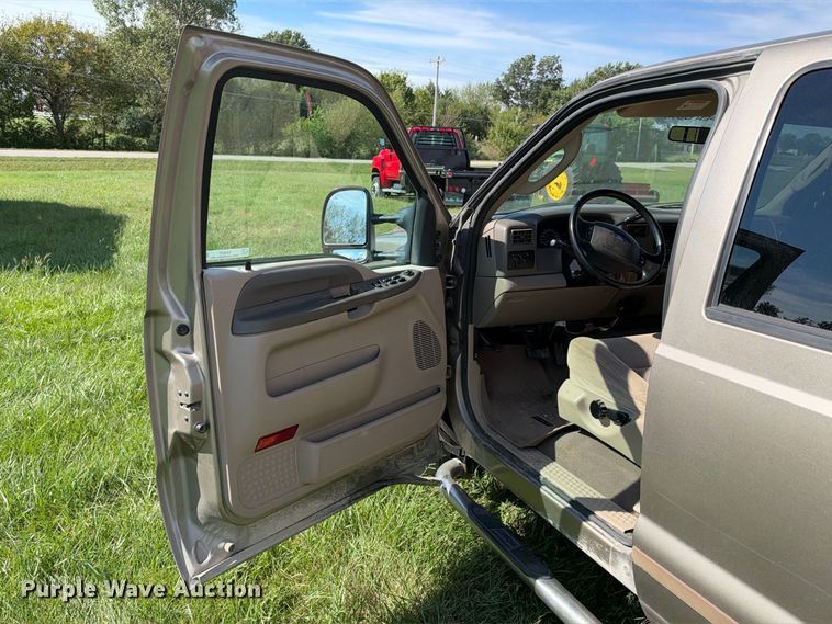 image for item EX2277 2003 Ford F250 Super Duty XLT Crew Cab flatbed pickup truck