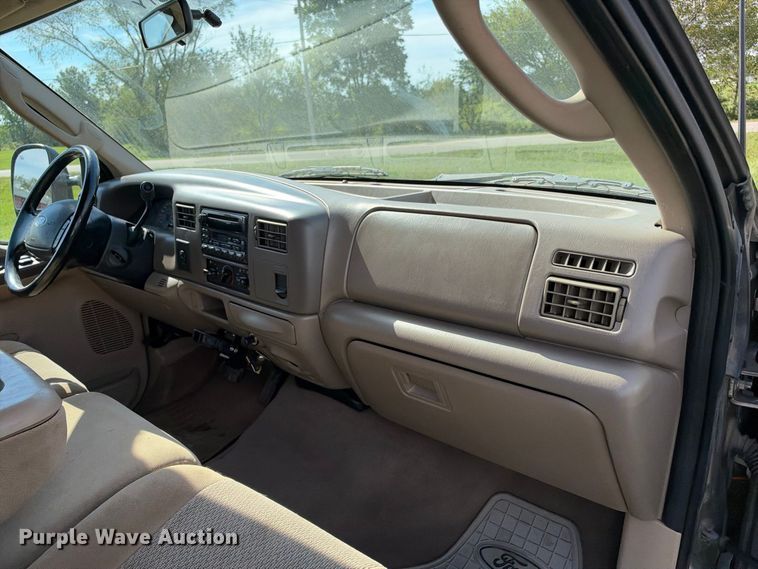 image for item EX2277 2003 Ford F250 Super Duty XLT Crew Cab flatbed pickup truck