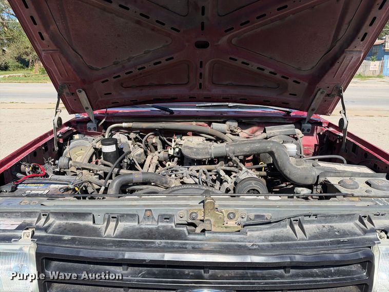 image for item EX2324 1988 Ford F250 flatbed pickup truck