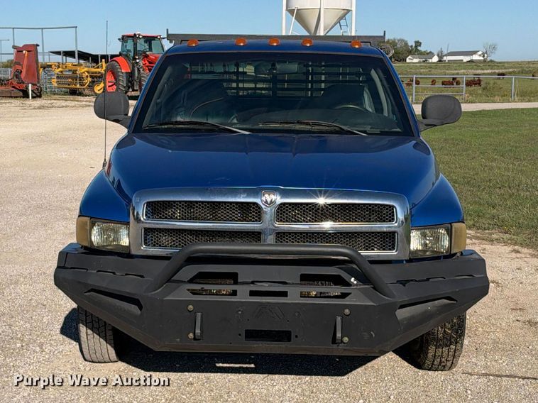 image for item EX2358 1999 Dodge Ram 3500 Ext. Cab flatbed pickup truck