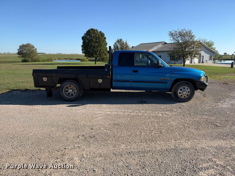 image for item EX2358 1999 Dodge Ram 3500 Ext. Cab flatbed pickup truck